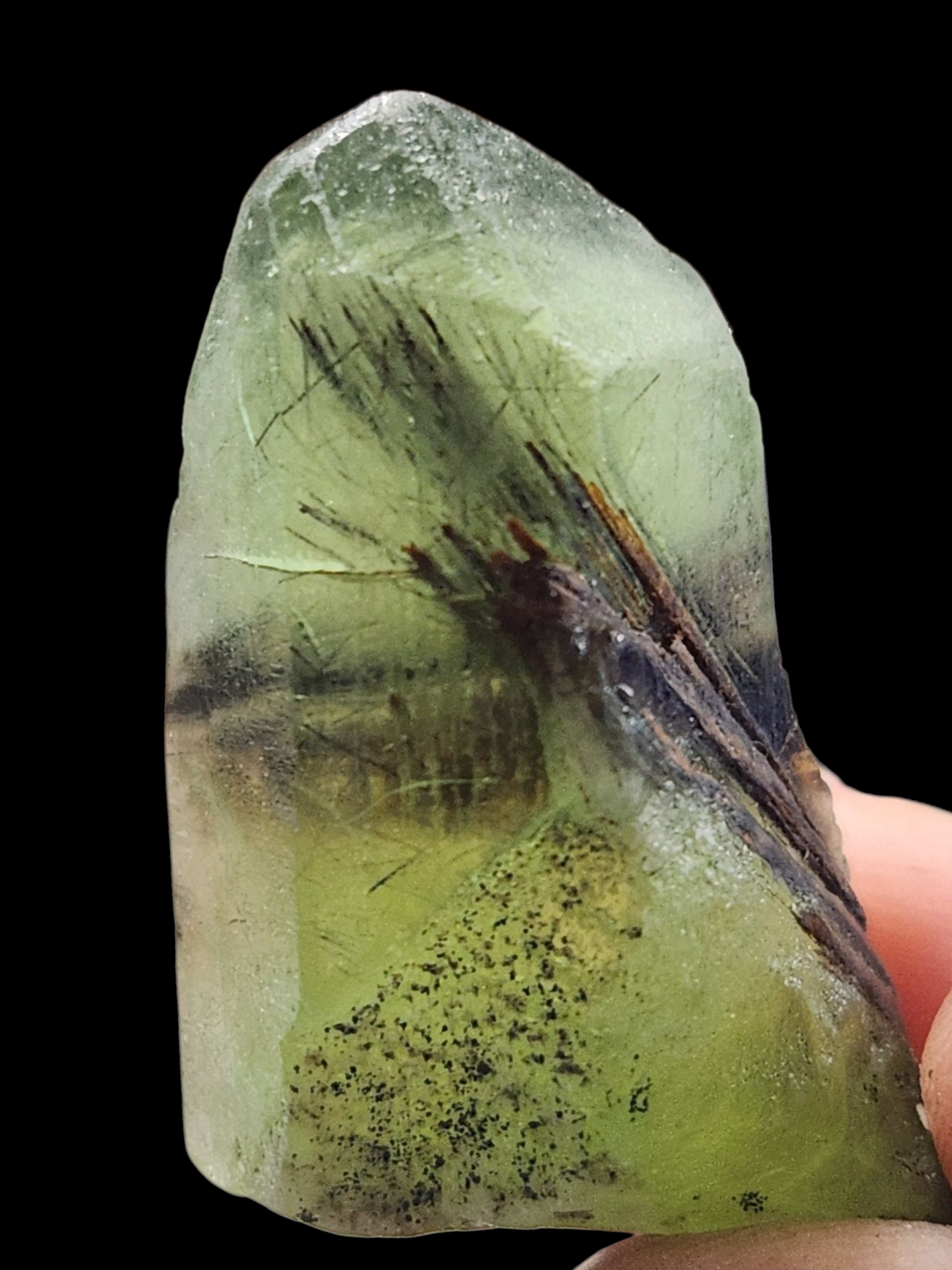 Peridot w/ ludwigite inclusion