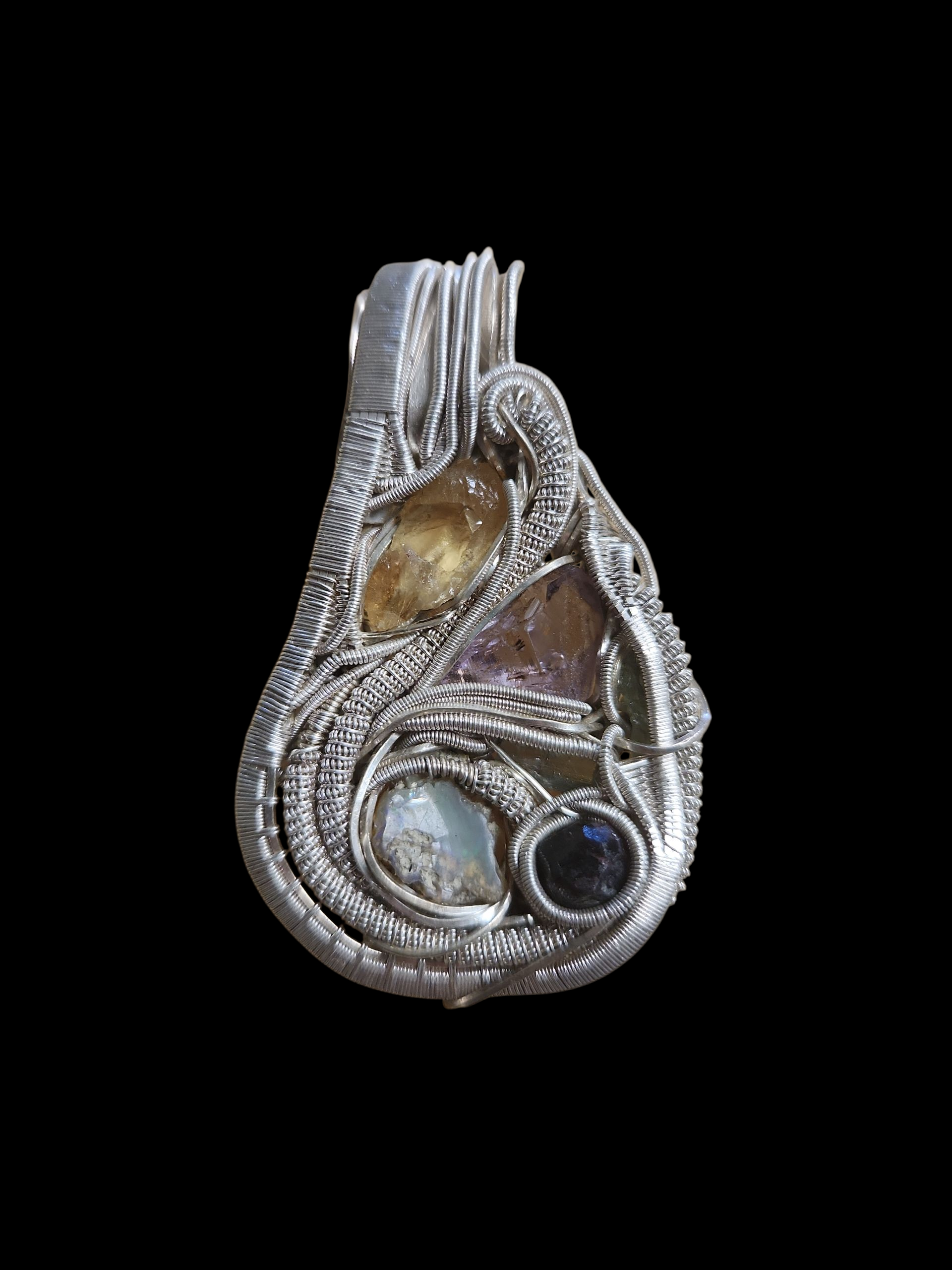 Silver wire wrapped pendant w/ gemstones