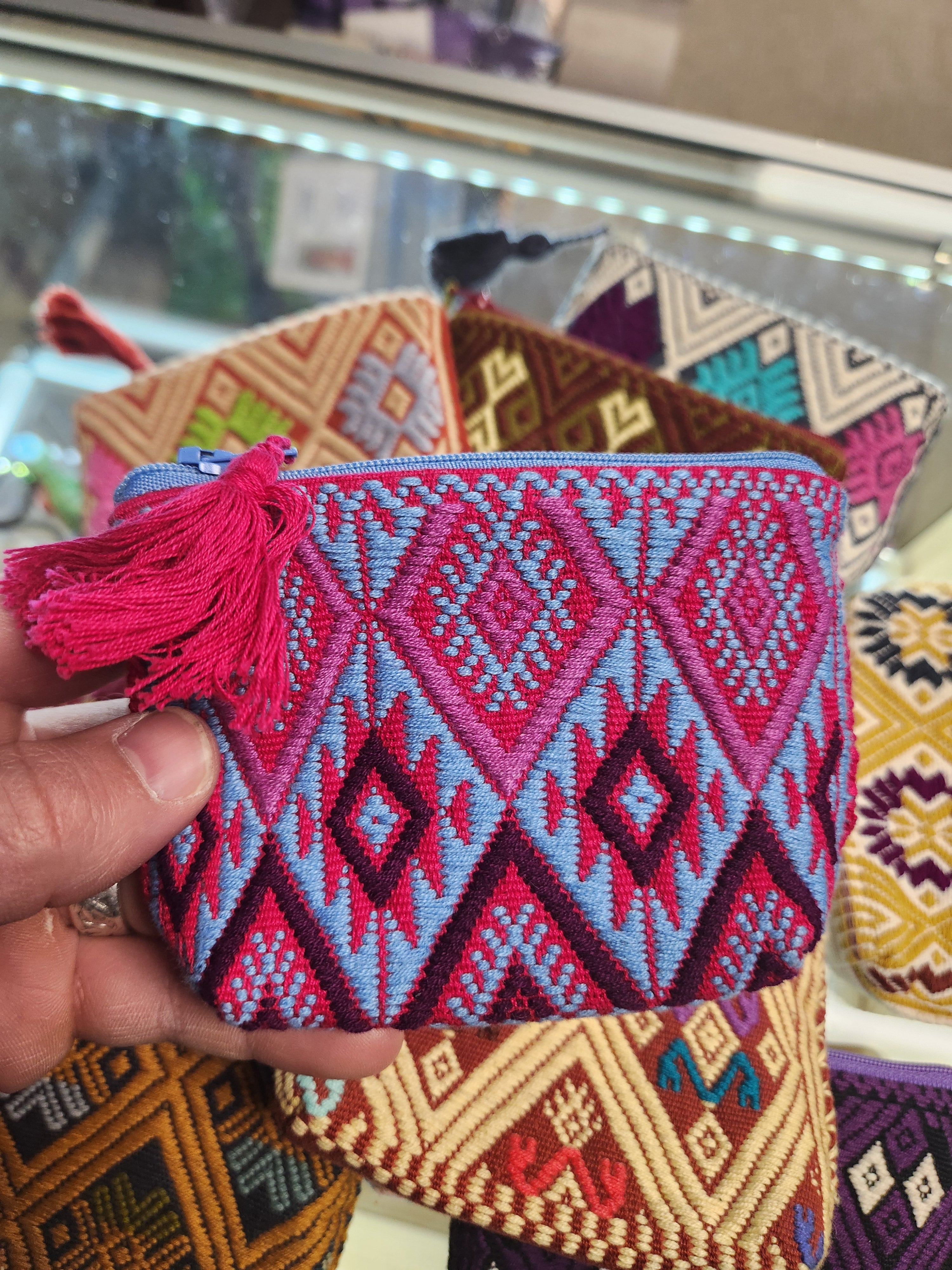 Assorted embroidered pouches
