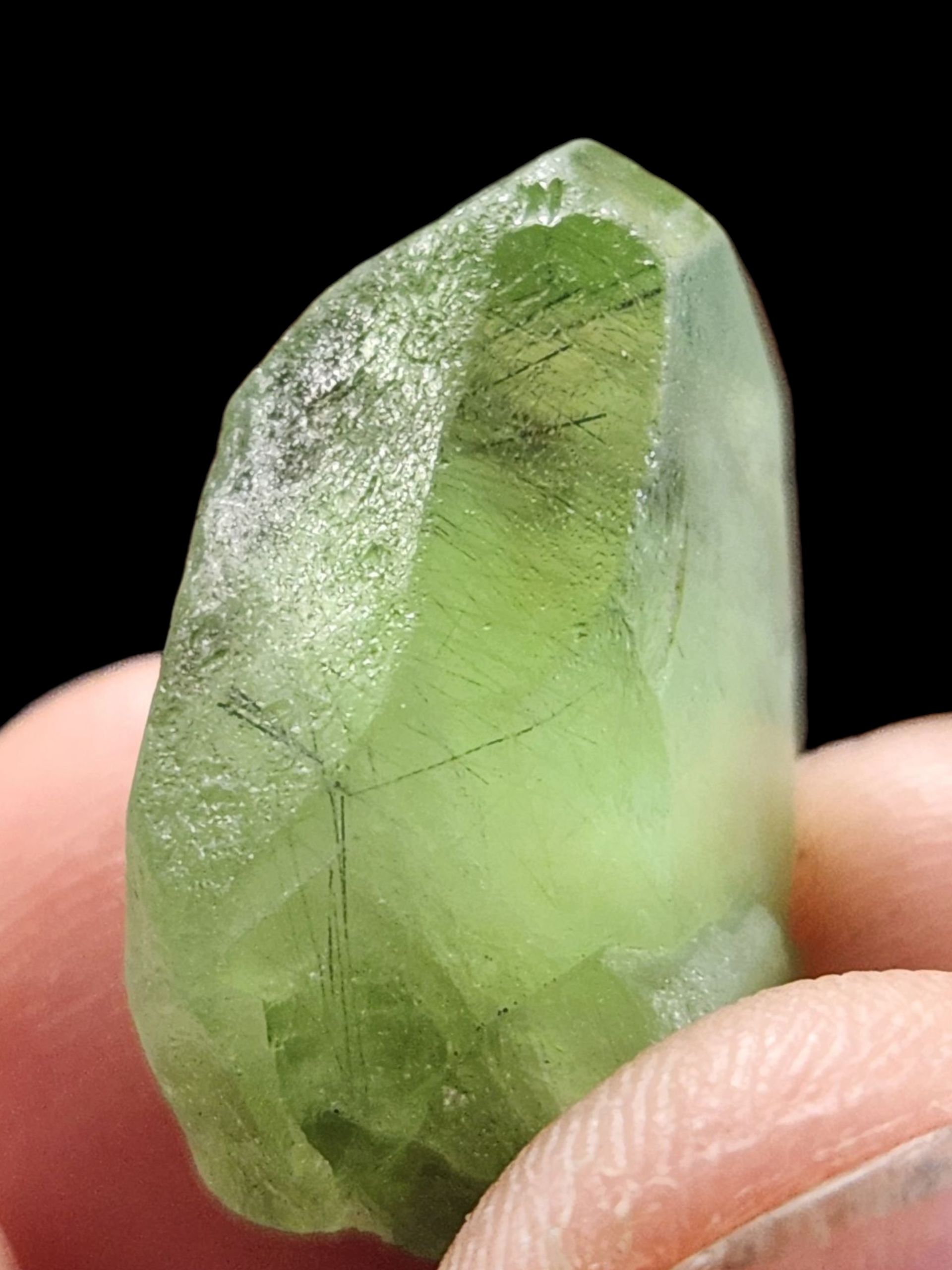 Peridot w/ ludwigite inclusions