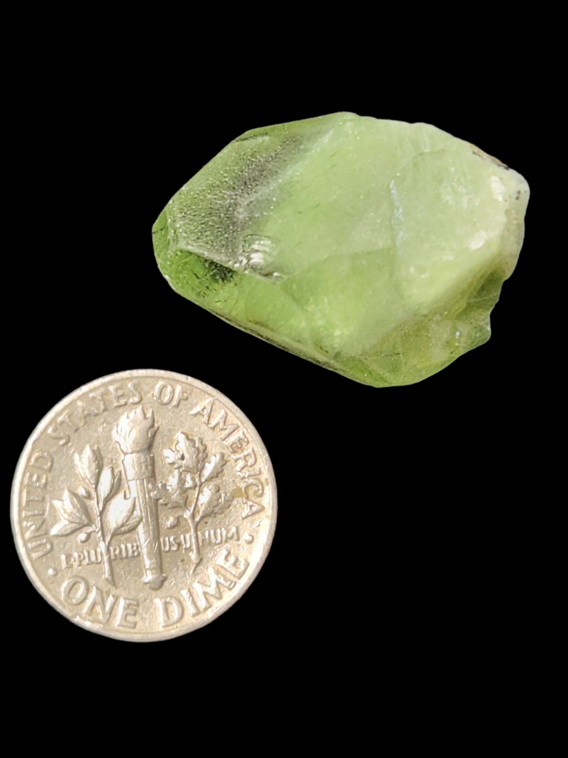 Peridot w/ ludwigite inclusions