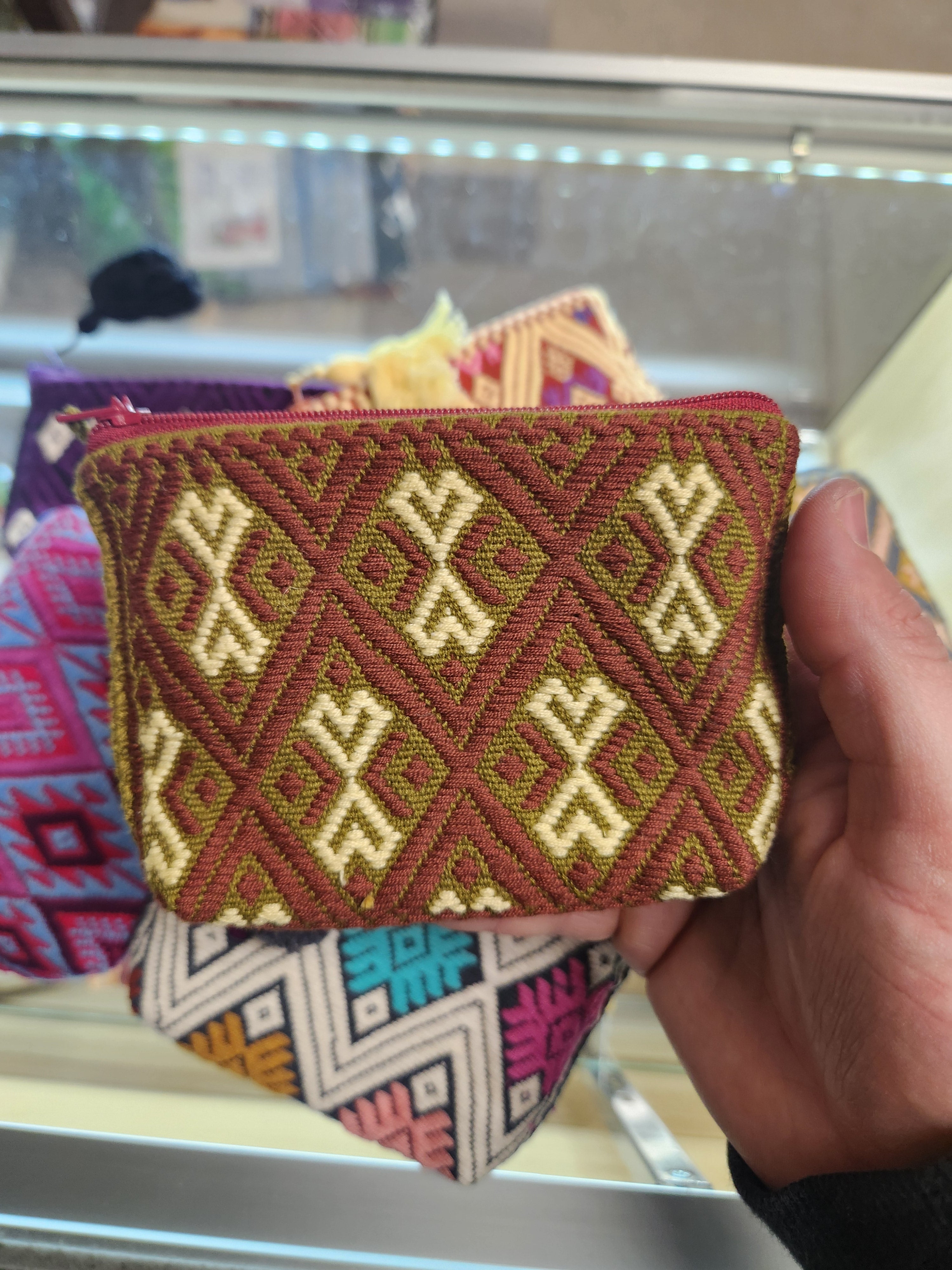 Assorted embroidered pouches