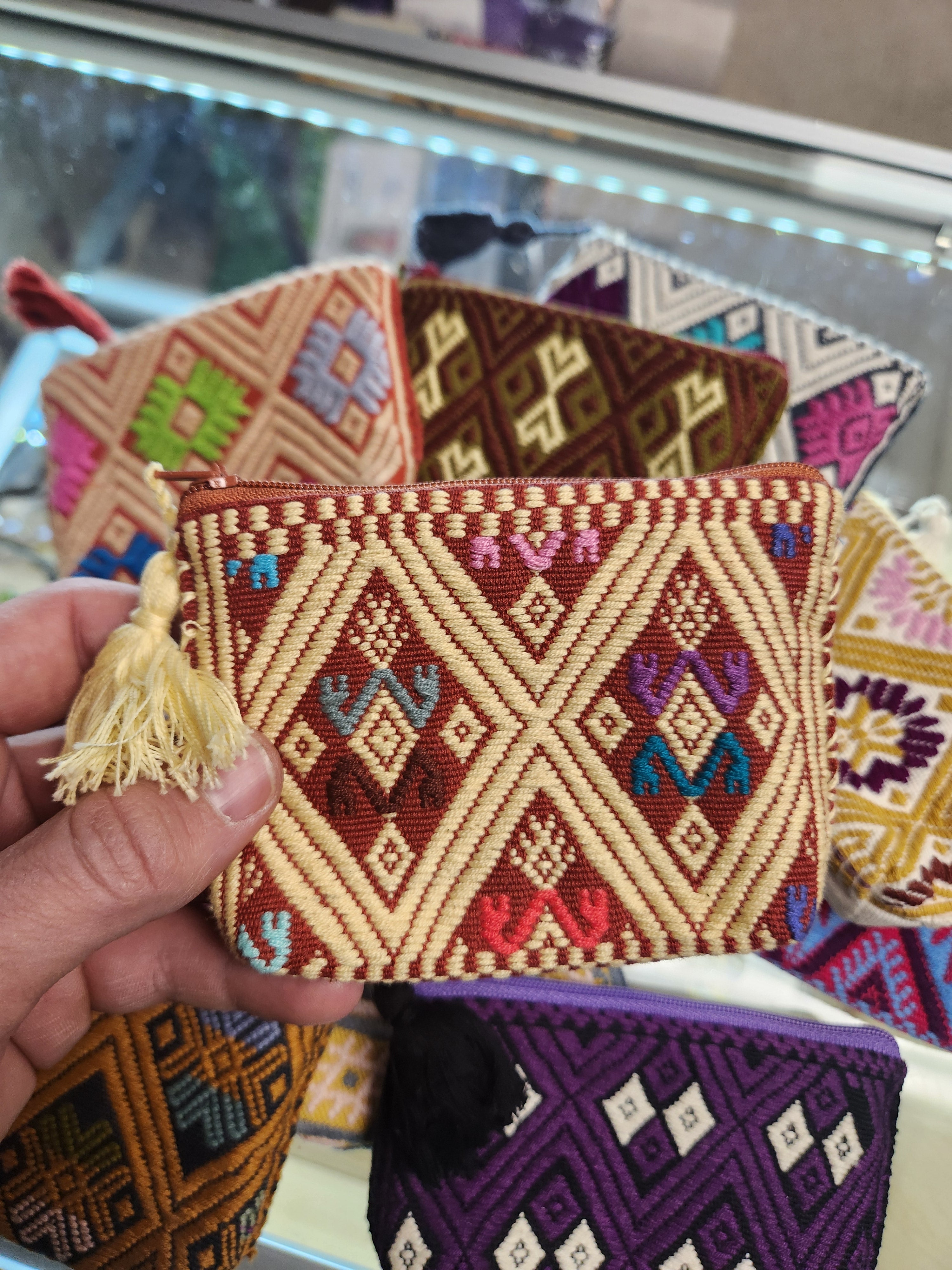 Assorted embroidered pouches