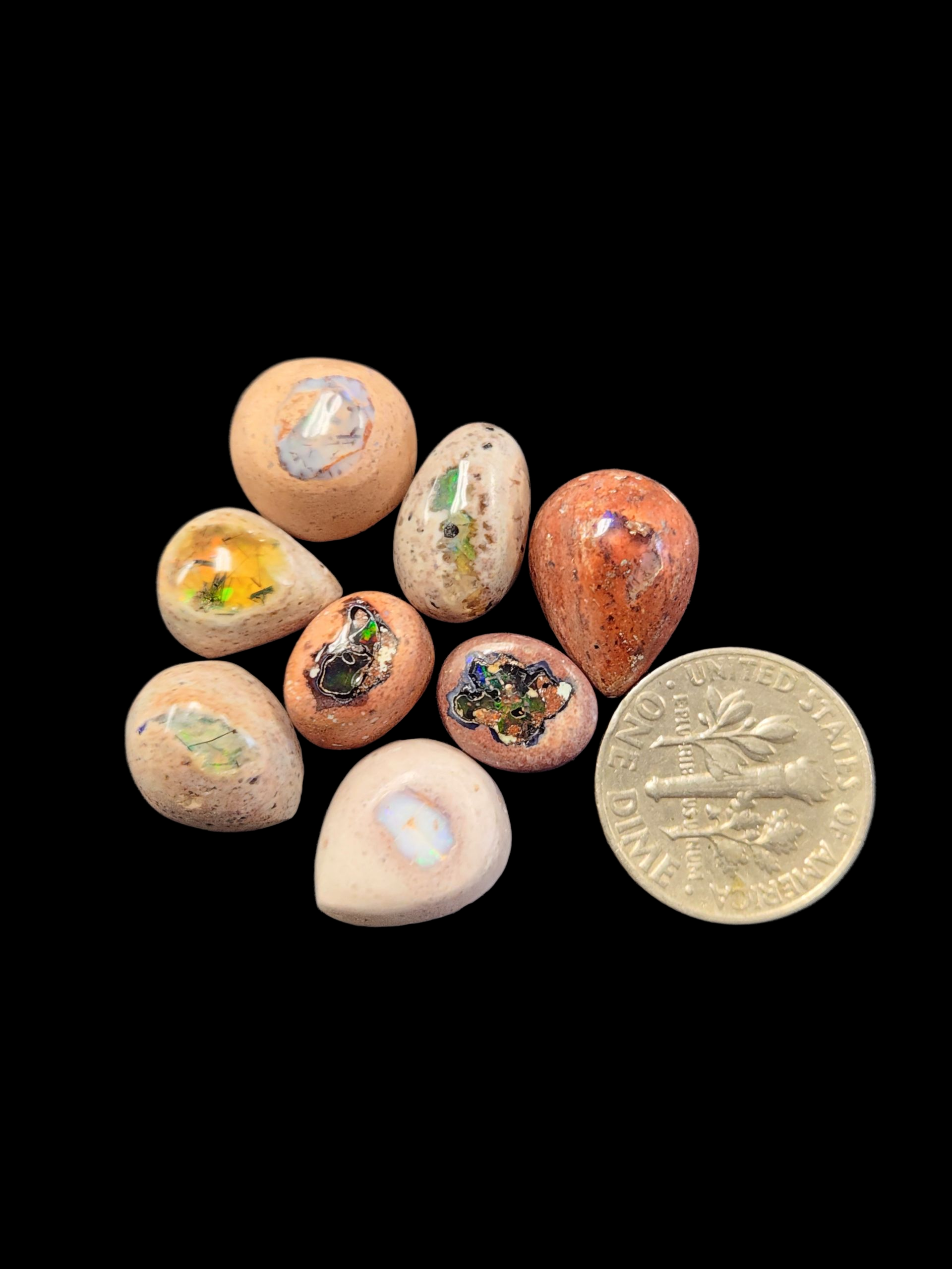 Mexican opal cabs on matrix