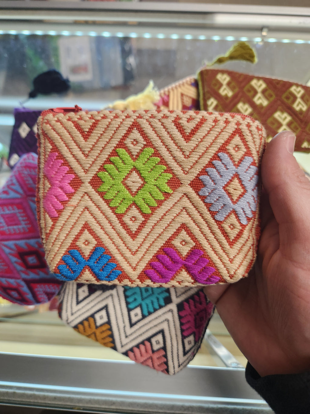 Assorted embroidered pouches