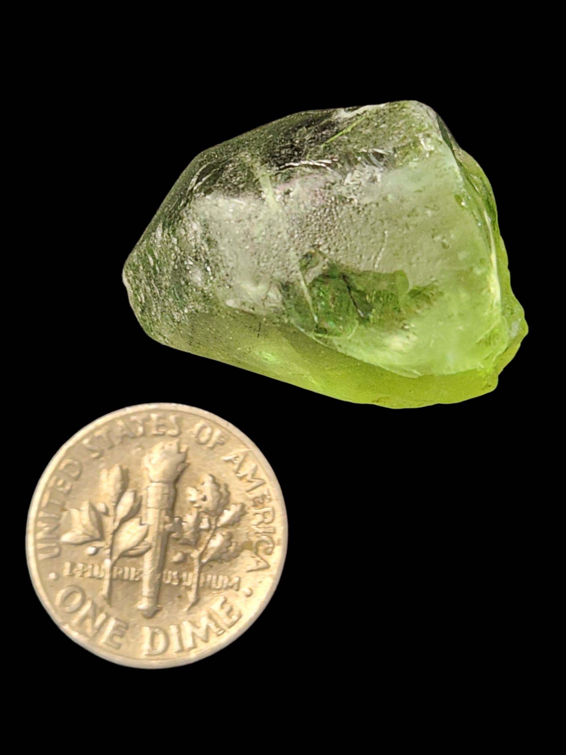 Peridot w/ ludwigite inclusion