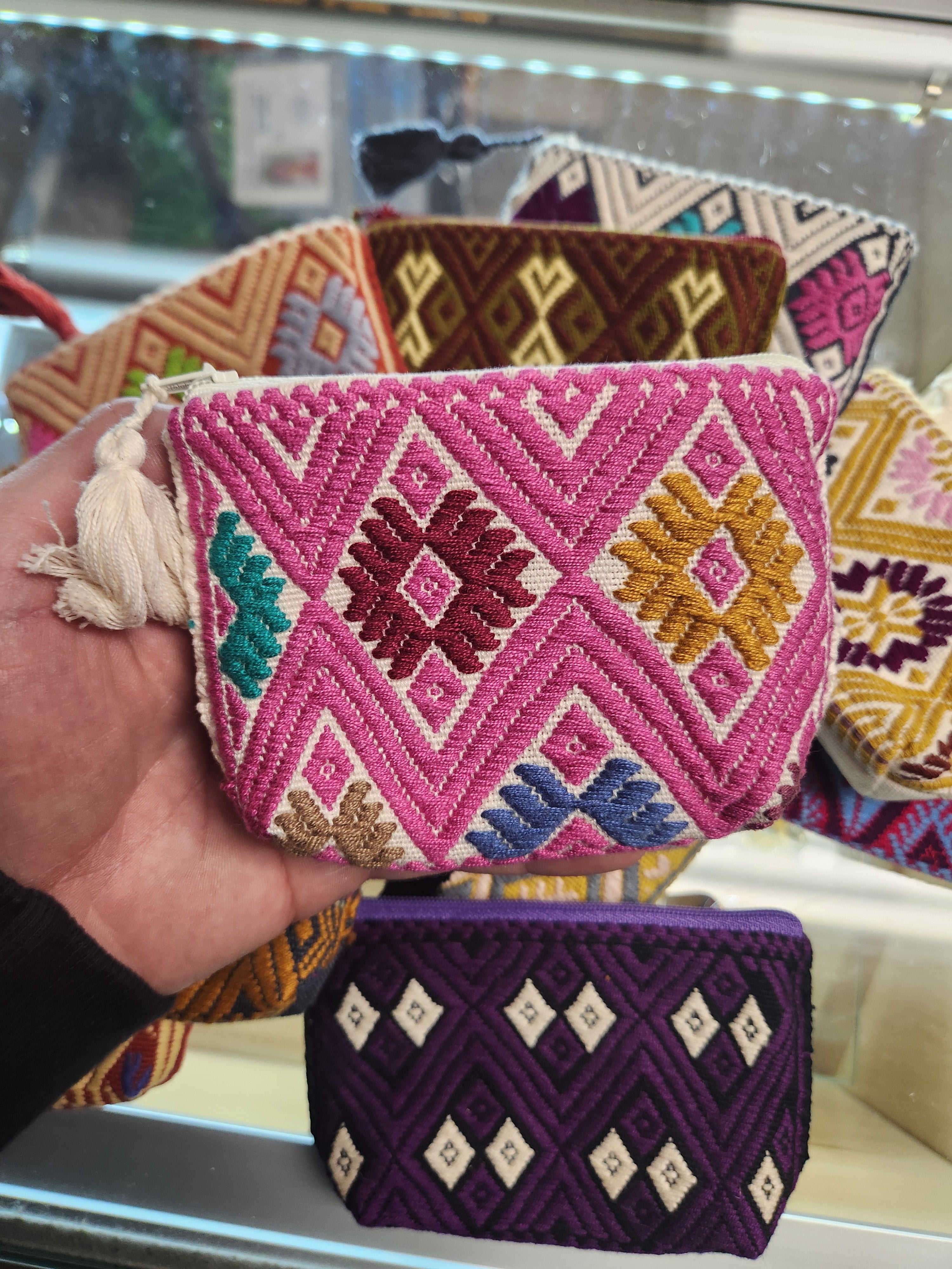 Assorted embroidered pouches