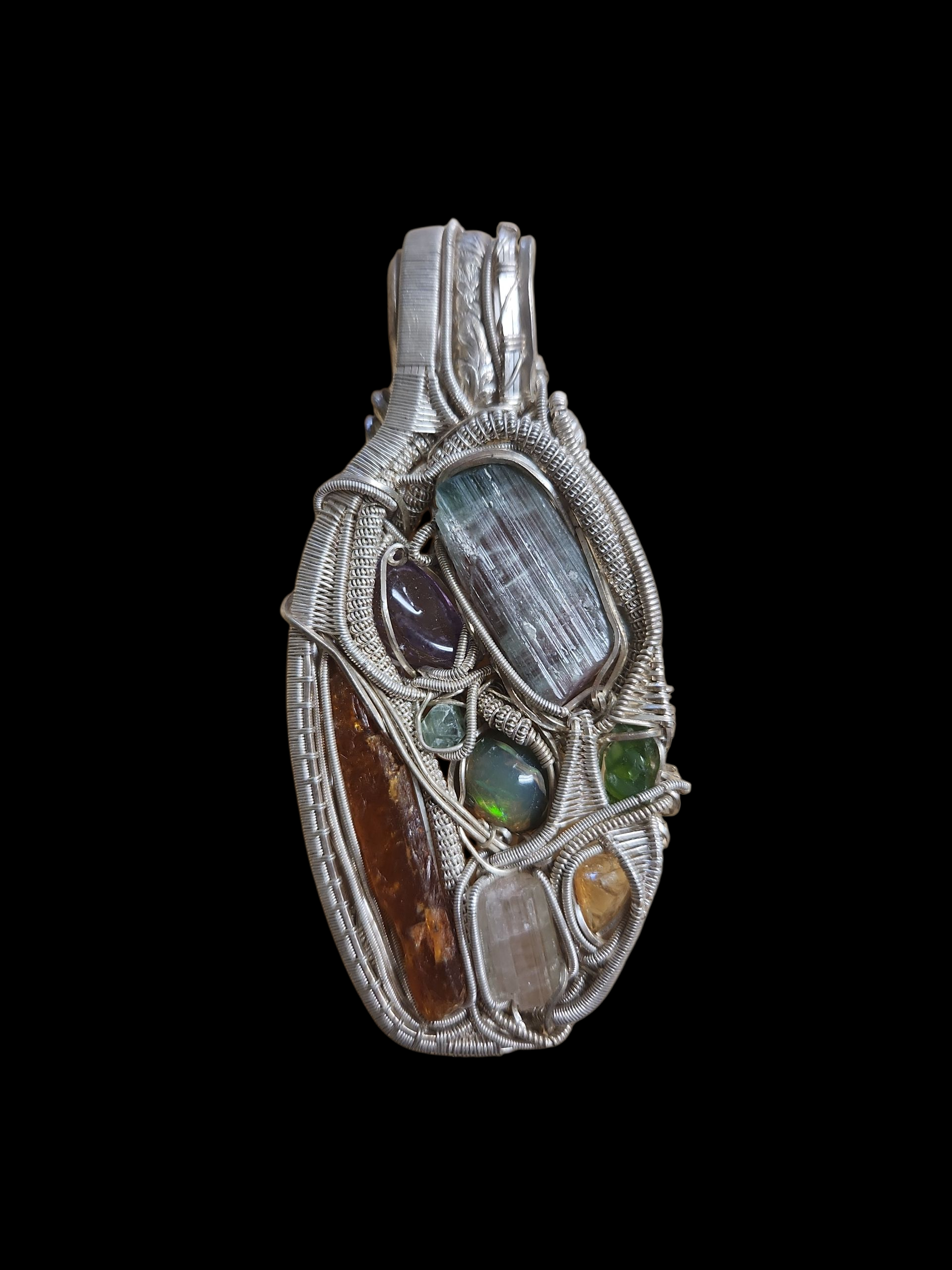 Silver wire wrapped pendant w/ gemstones