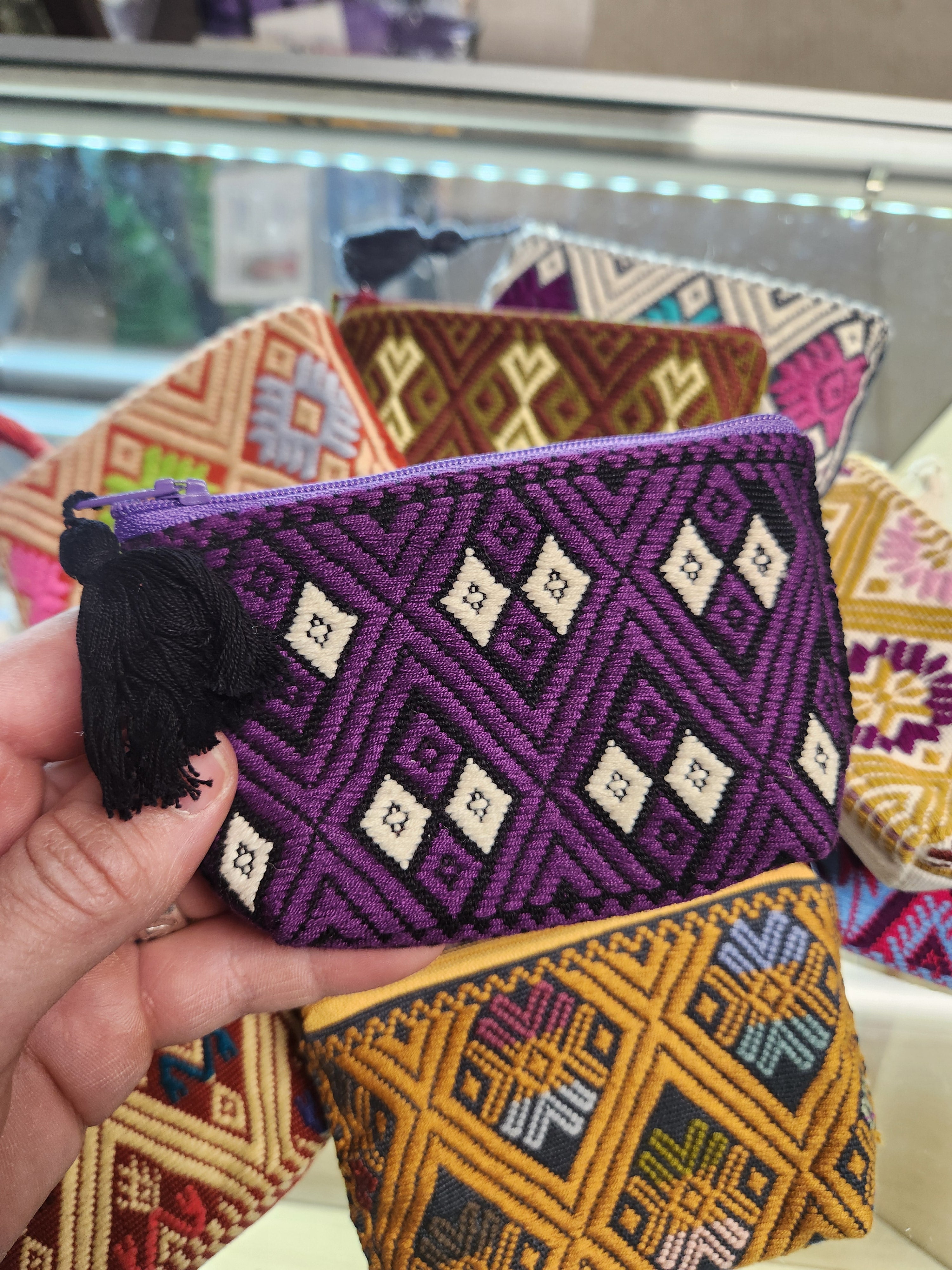 Assorted embroidered pouches