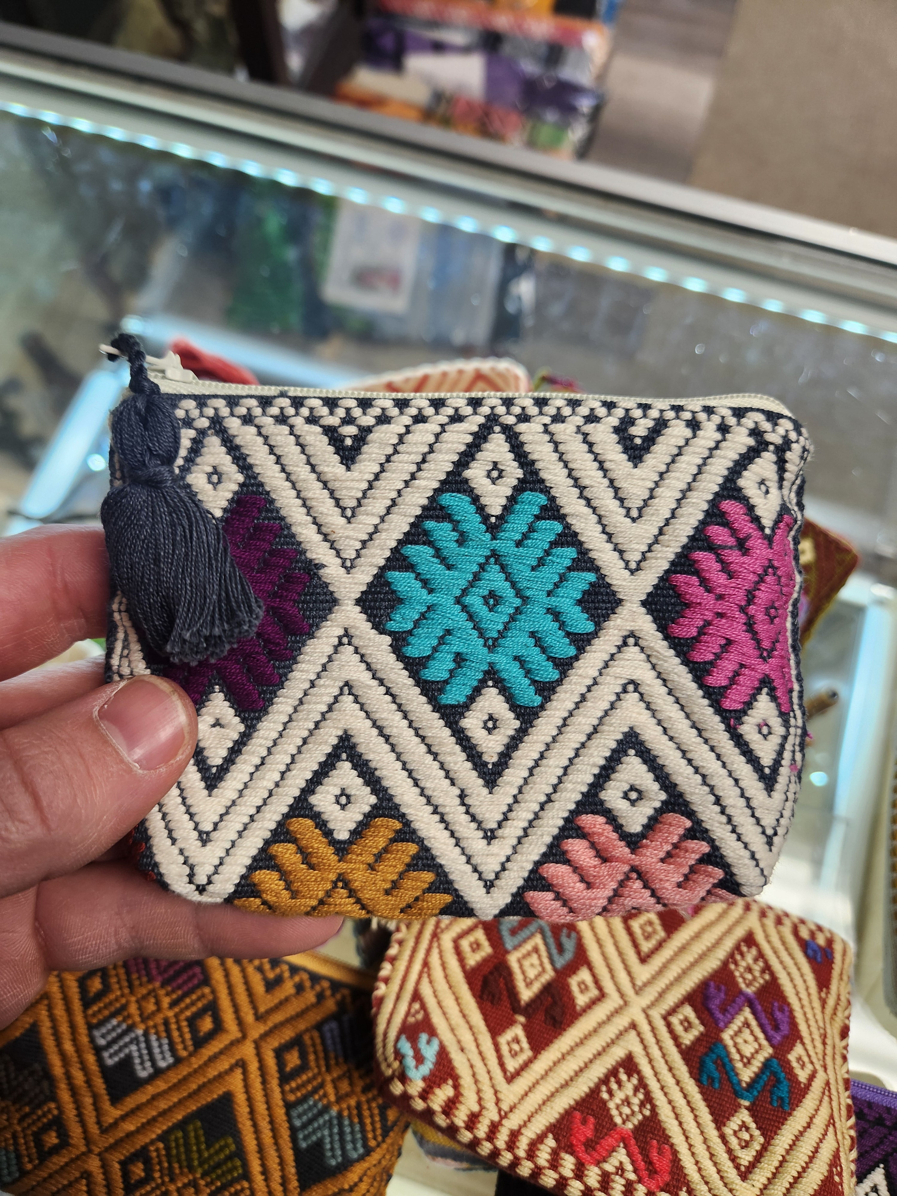 Assorted embroidered pouches