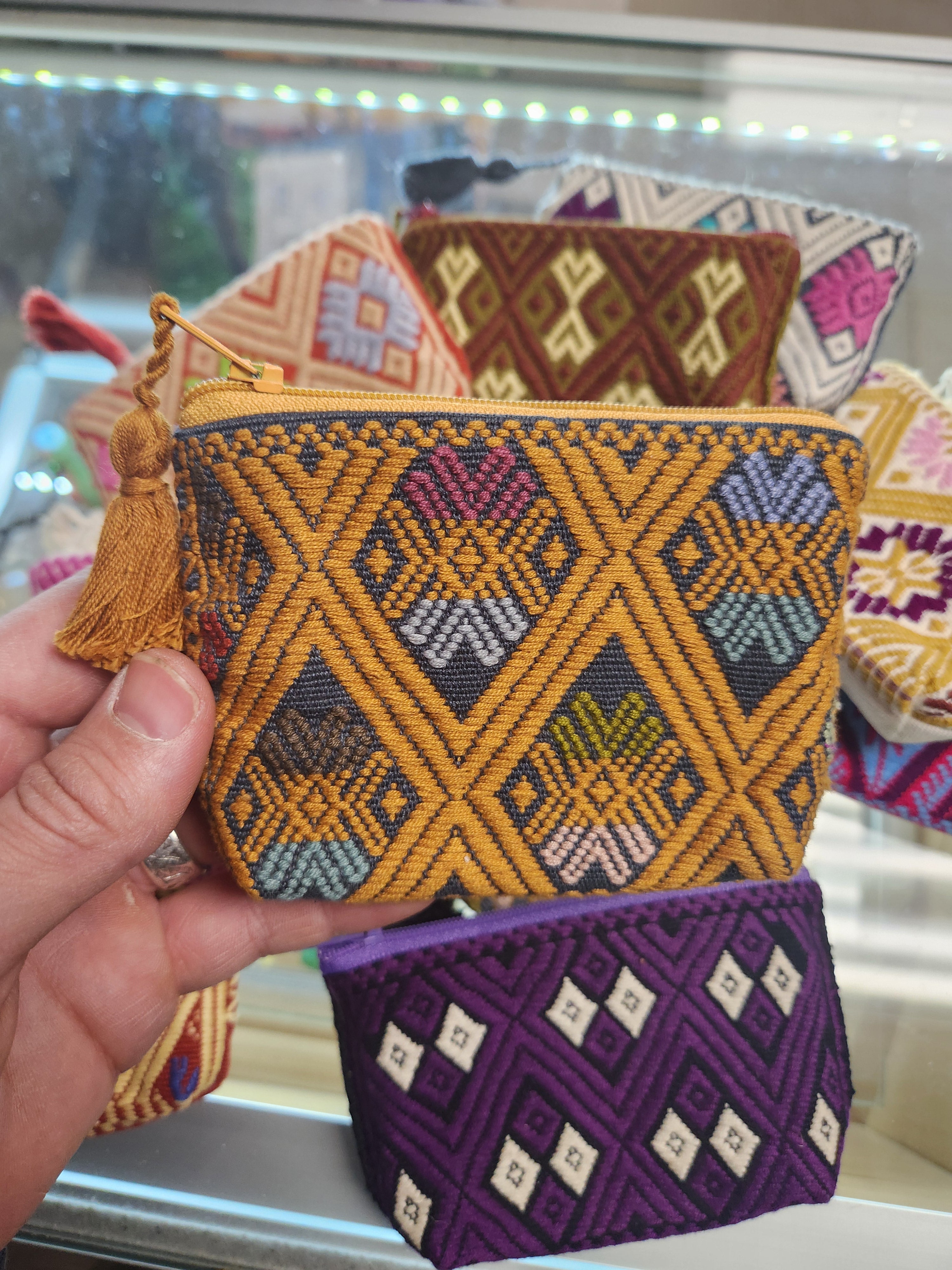Assorted embroidered pouches