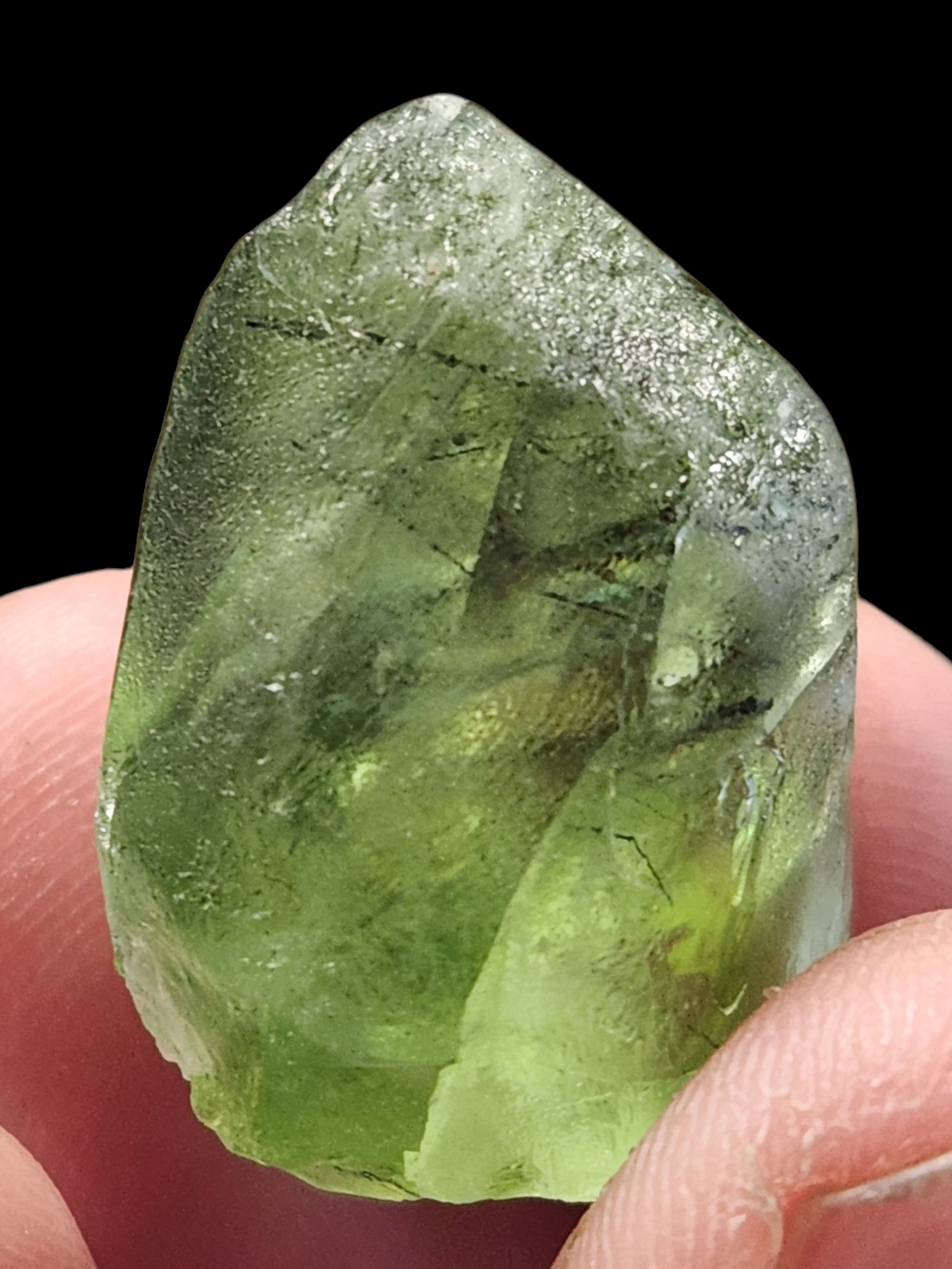 Peridot w/ ludwigite inclusion