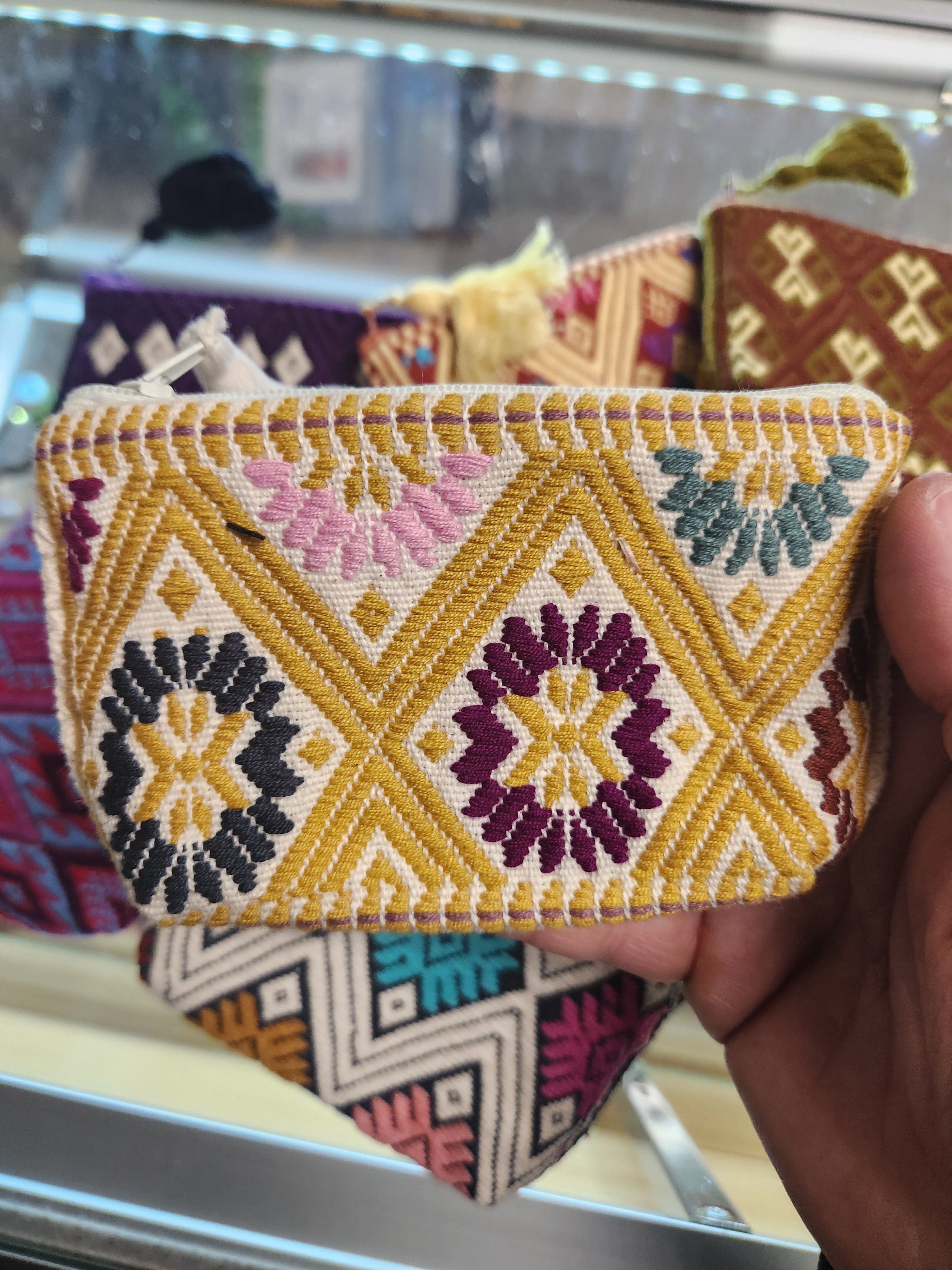 Assorted embroidered pouches